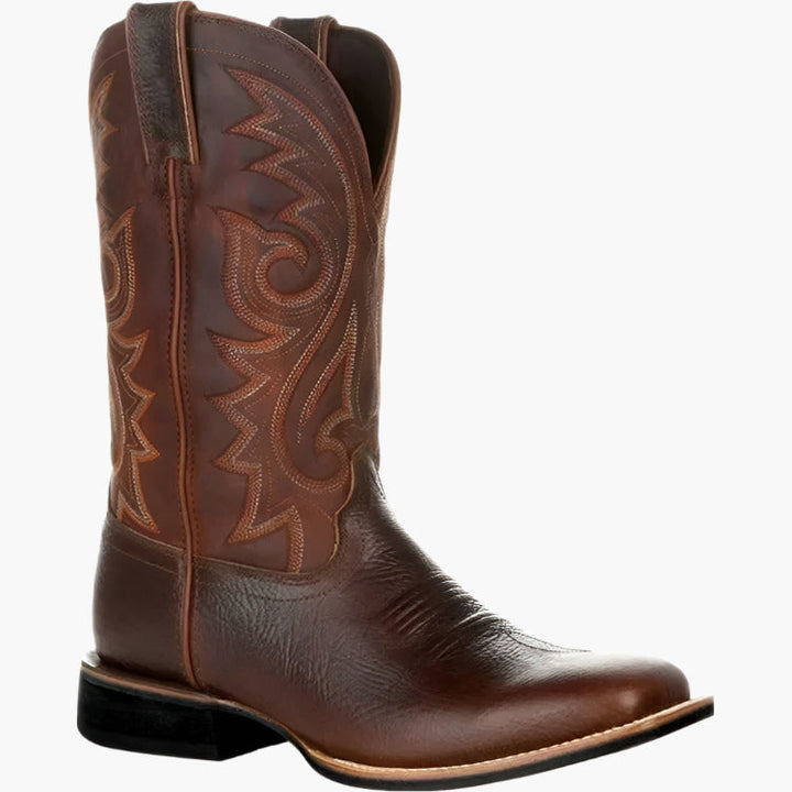 Stilren herr cowboyboot i brunt läder, perfekt för både vardag och fest.