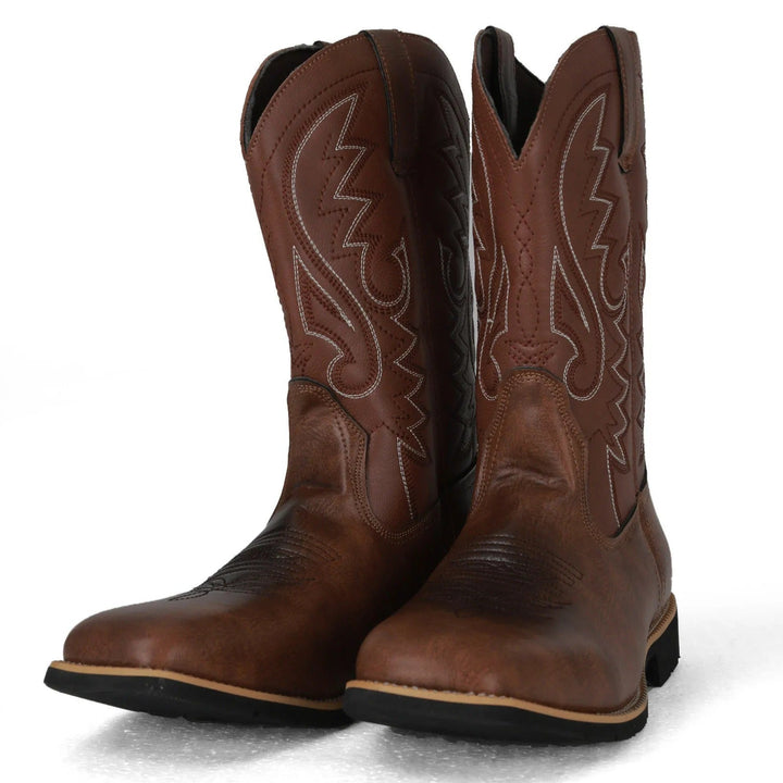 Herr cowboyboots med slip-on-design, ger en stilren och bekväm passform för herrmode.