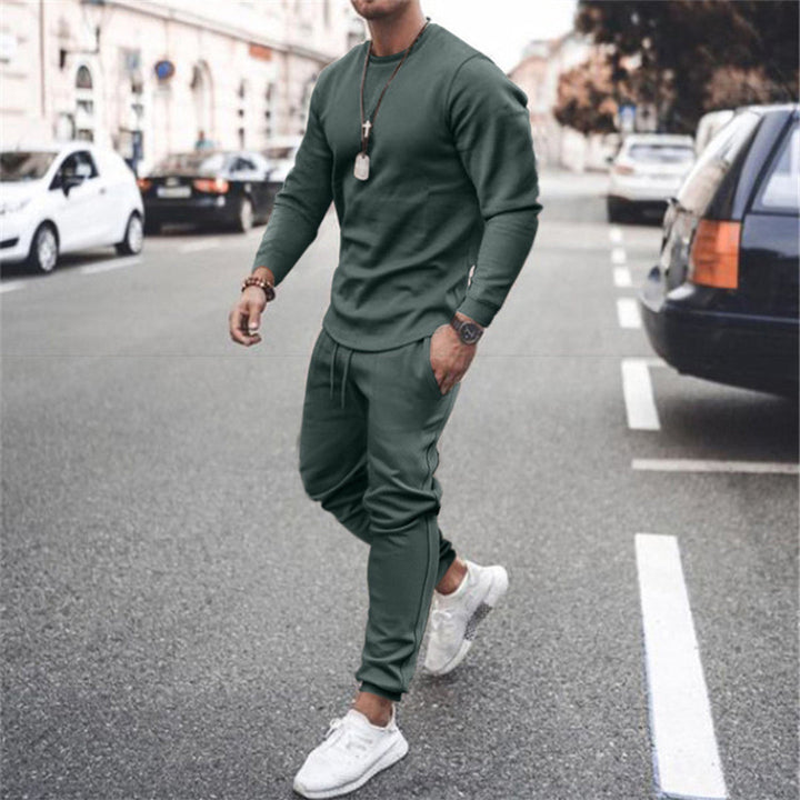 Stilren herr joggingdräkt, tvådelat set för män. Bekväma fritidskläder, perfekt höstmode.