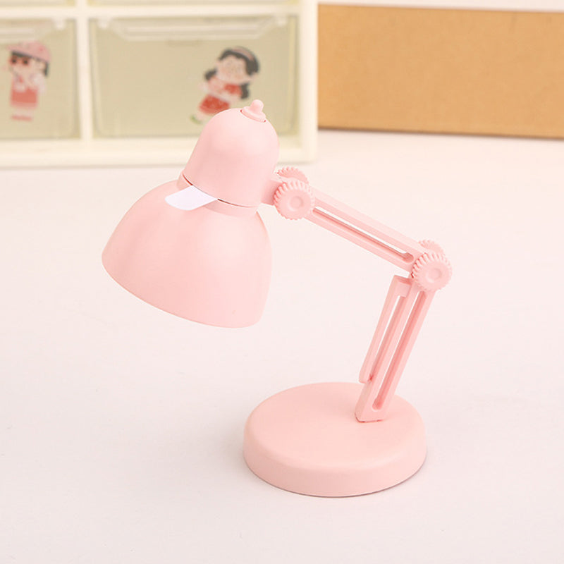 "Stilren magnetisk mini skrivbordslampa i flera färger med justerbar vinkel och bärbar kompakt design."
