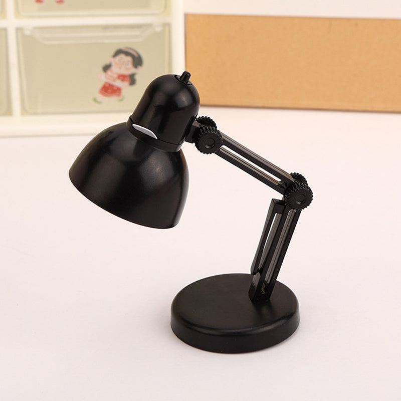 "Stilren magnetisk mini skrivbordslampa i flera färger med justerbar vinkel och bärbar kompakt design."