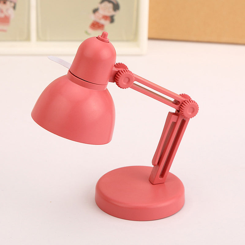 "Stilren magnetisk mini skrivbordslampa i flera färger med justerbar vinkel och bärbar kompakt design."