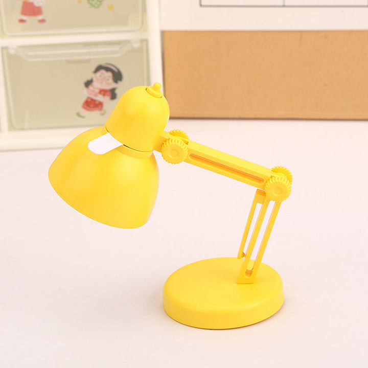 "Stilren magnetisk mini skrivbordslampa i flera färger med justerbar vinkel och bärbar kompakt design."