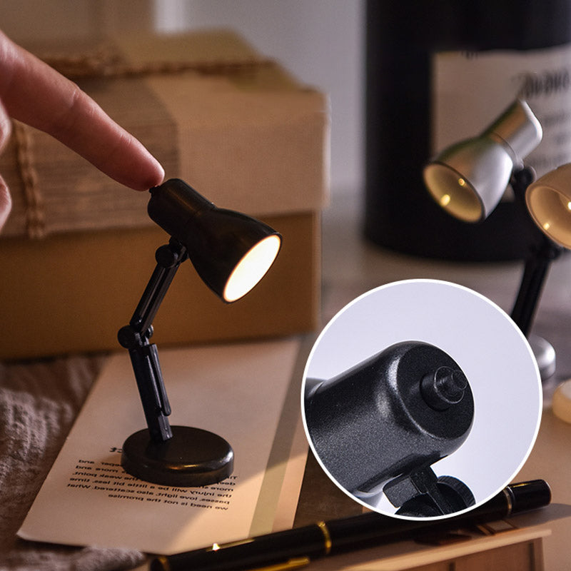 "Stilren magnetisk mini skrivbordslampa i flera färger med justerbar vinkel och bärbar kompakt design."