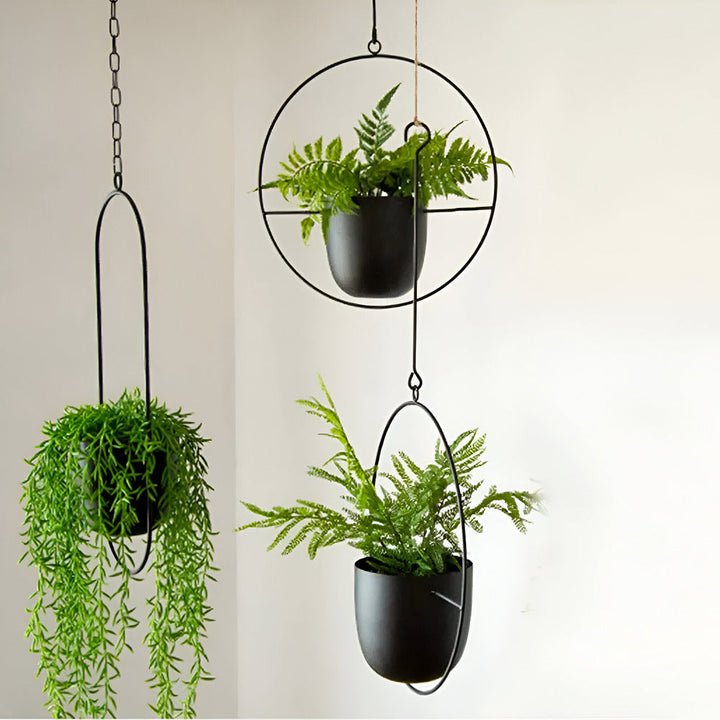 Stilren minimalistisk hängande blomkruka för modern inredning i hem och kontor. Perfekt växtkruka.
