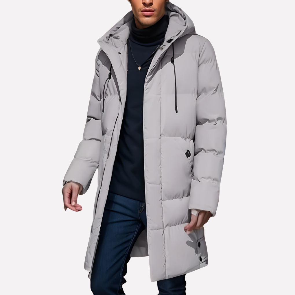 Herrarnas quiltade casual vinterjacka i mörkblå. Ett varmt och bekvämt ytterplagg för vardagsbruk.