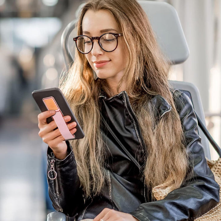 "Stilren självhäftande telefonhållare och grepp för mobiler med slimmad design i svart, silver, guld, blå, roseguld."