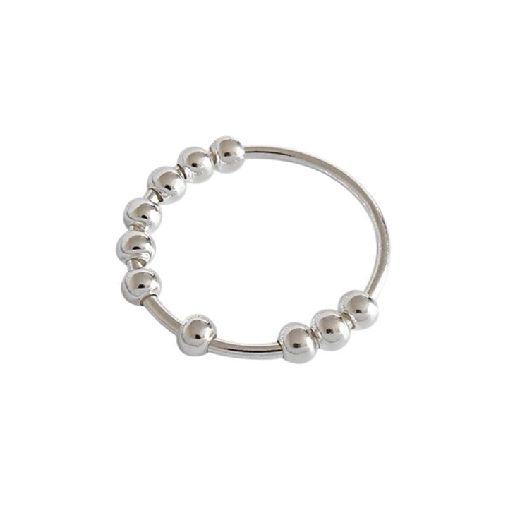 "Stilren Spinner Fidget Ring i silver för stresslindring, med roterande pärlor. Perfekt accessoar för både män och kvinnor."