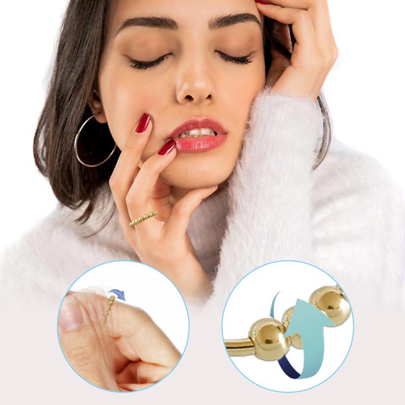 "Stilren Spinner Fidget Ring i silver för stresslindring, med roterande pärlor. Perfekt accessoar för både män och kvinnor."