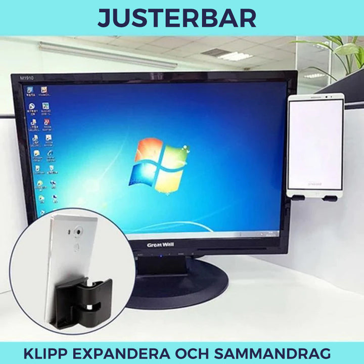 "Stilren svart telefonhållare vid datorskärm, förbättrar interaktion och sparar utrymme, idealisk för smartphones och surfpla