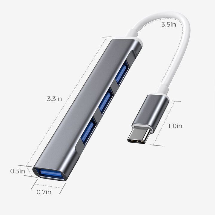 "Stilren USB Typ C HUB i silver med 4 portar för snabb anslutning och höghastighetsöverföring, kompakt och användarvänlig."