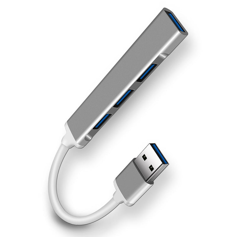 "Stilren USB Typ C HUB i silver med 4 portar för snabb anslutning och höghastighetsöverföring, kompakt och användarvänlig."