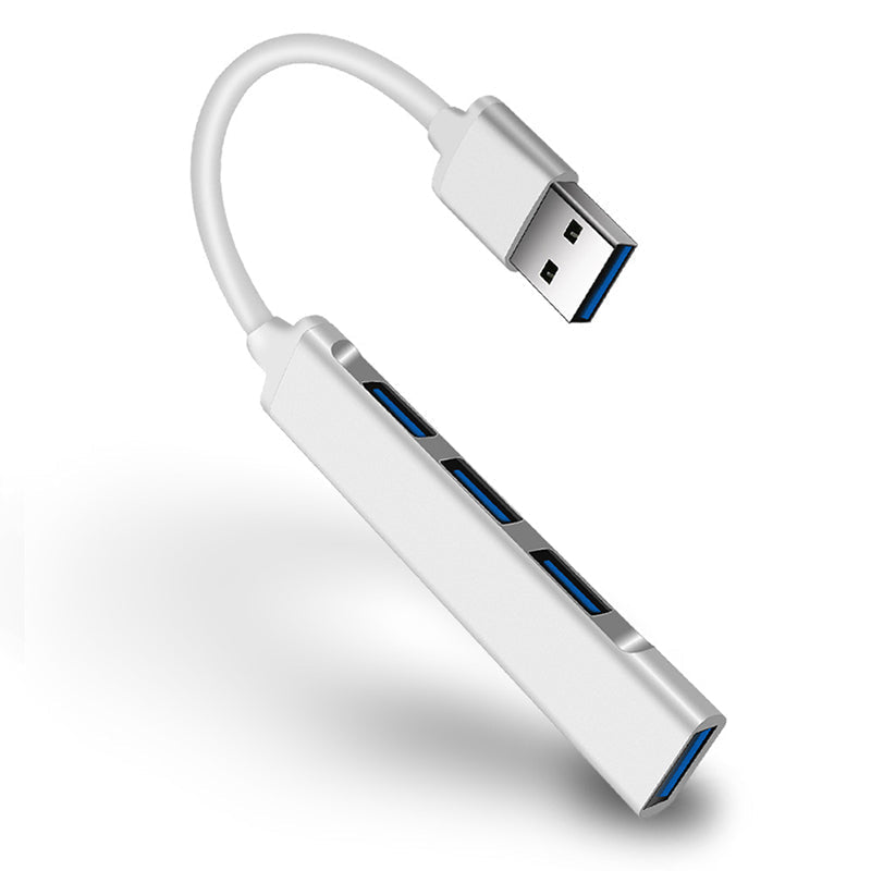 "Stilren USB Typ C HUB i silver med 4 portar för snabb anslutning och höghastighetsöverföring, kompakt och användarvänlig."