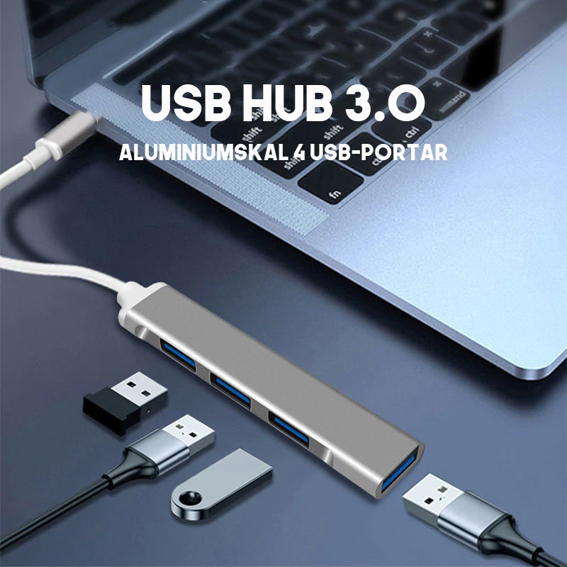 "Stilren USB Typ C HUB i silver med 4 portar för snabb anslutning och höghastighetsöverföring, kompakt och användarvänlig."