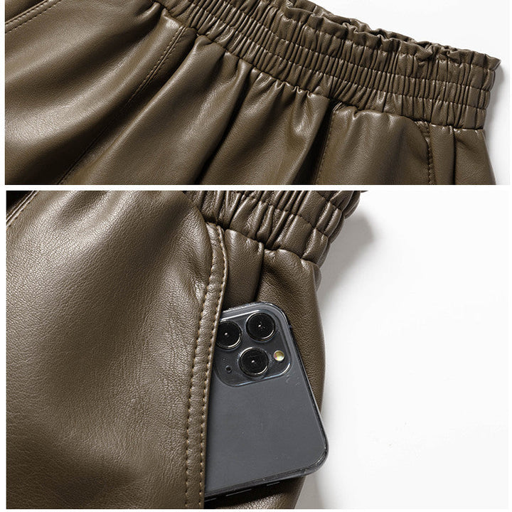 Detaljbild av grå kvinnorshorts, framhävandes det mjuka tyget för fritidsbruk.