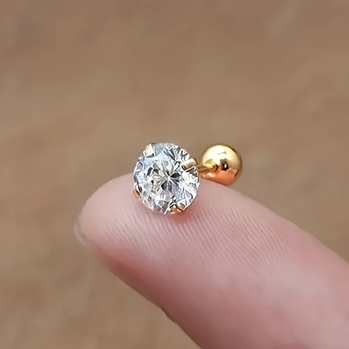 Allergivänliga titanstålörhängen med zirkoniasten. Runda silverfärgade smycken, stilrena.