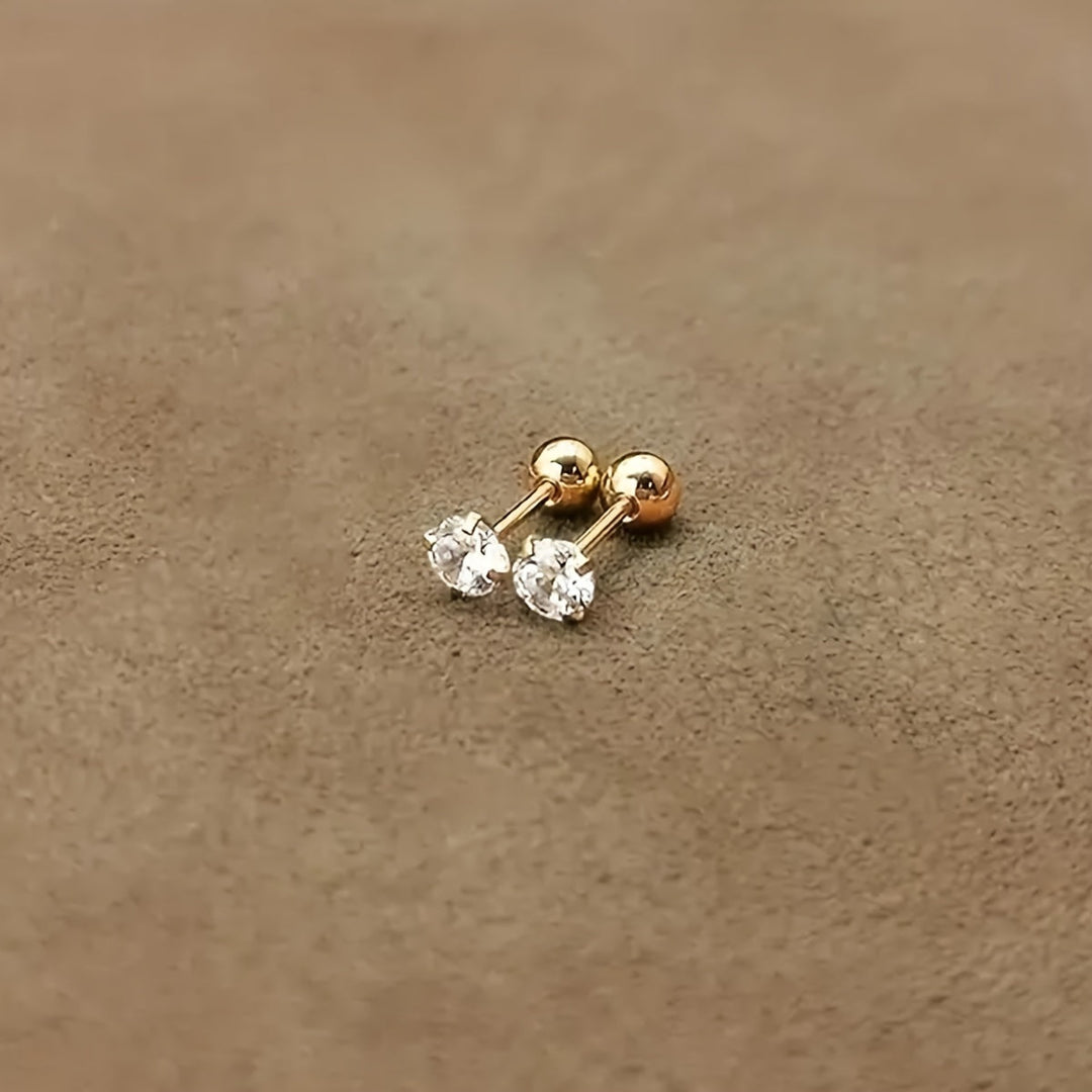 Eleganta titanstålörhängen med zirkonia. Slitstarka, stilrena unisex smycken för en sofistikerad look.