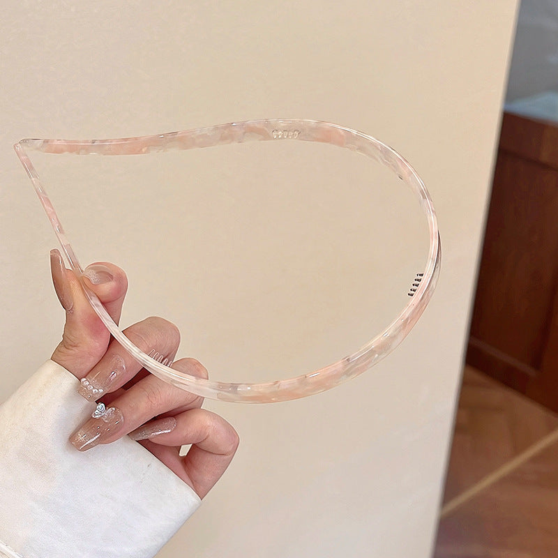 "Stilrent unisex acetatpannband för glasögon, böjt design, perfekt för dag och natt. Accessoar för kvinnor, bekvämt, elegant.