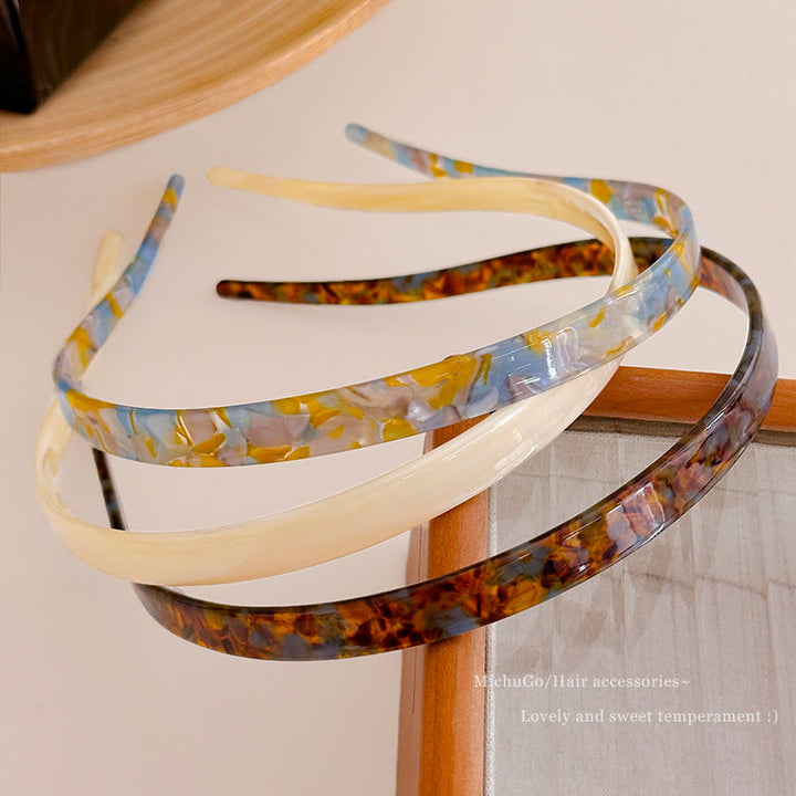 "Stilrent unisex acetatpannband för glasögon, böjt design, perfekt för dag och natt. Accessoar för kvinnor, bekvämt, elegant.