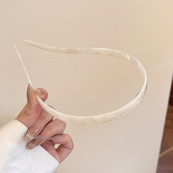 "Stilrent unisex acetatpannband för glasögon, böjt design, perfekt för dag och natt. Accessoar för kvinnor, bekvämt, elegant.