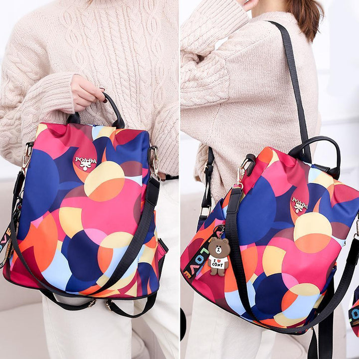 "Stöldsäker damryggsäck med fjärilsmönster, stor kapacitet, Oxford- och polyestertyg, mångsidiga fickor, justerbara remmar."