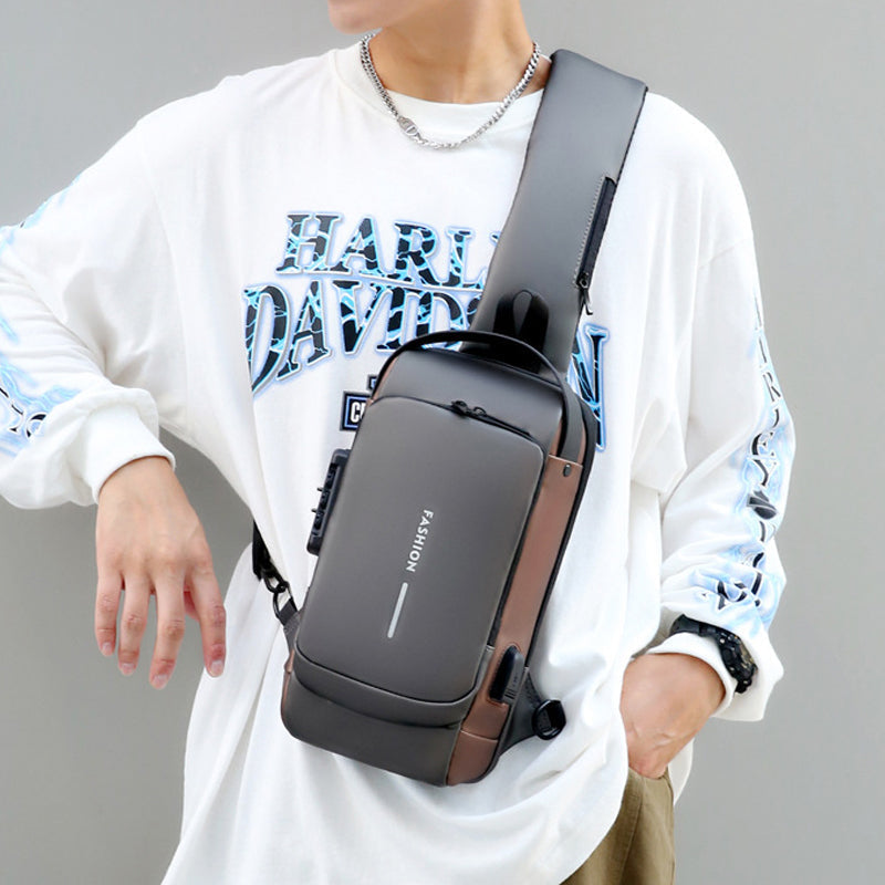 Stöldskyddad damkurirväska, minimalistisk design, grå och brun färg, med USB-laddning och TSA-lås.