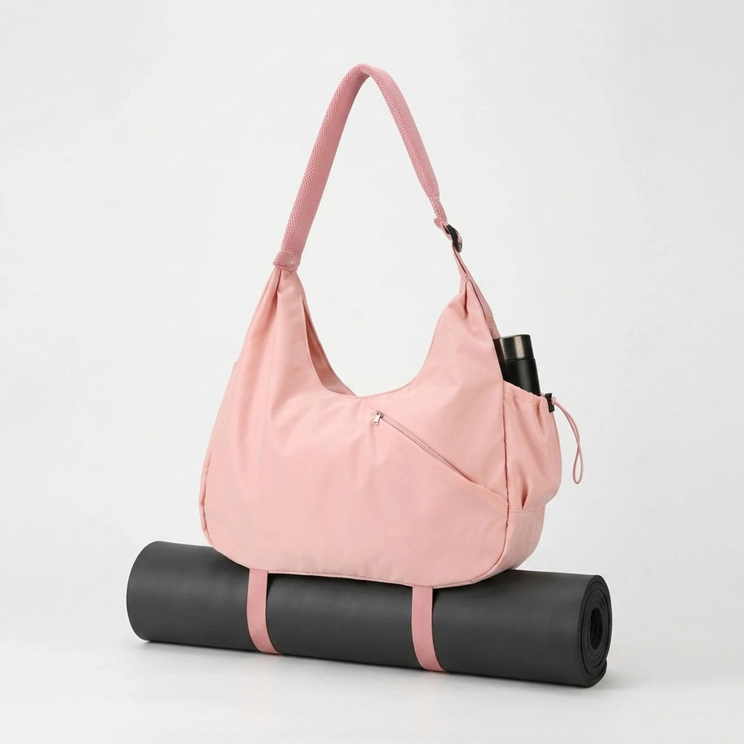 Rymlig yogaväska/gymväska i rosa för kvinnor, toteväska med plats för matta och träningskläder.