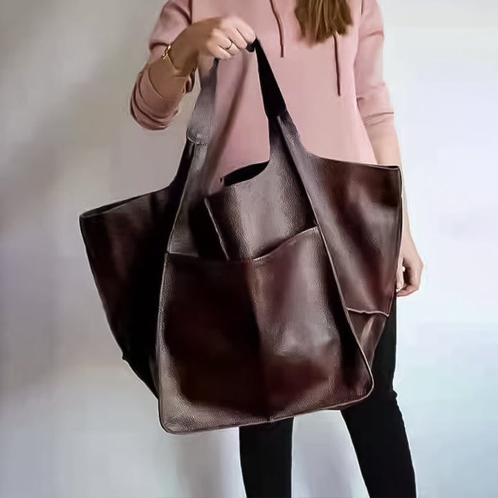 "Stor kapacitets läderhandväska för kvinnor i olika färger, elegant design i PU-läder för mångsidig användning."