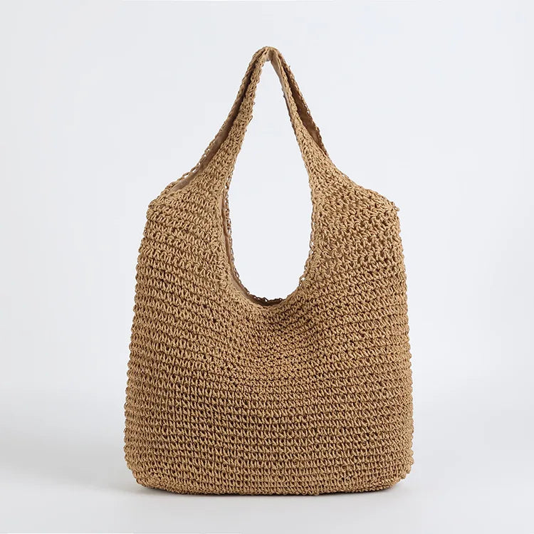 Rymlig solkysst handväska för kvinnor, brun beige. En mångsidig sommar- och strandväska.