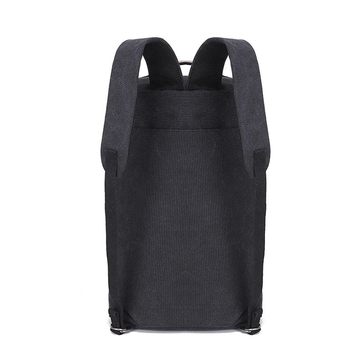 Grå canvasryggsäck, TrailHaven modell. Unisex och stor, idealisk som rese- eller vardagsryggsäck. Hållbar design.