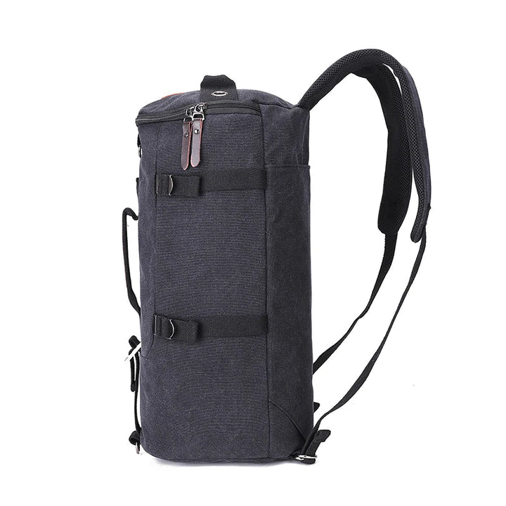 Svart stor canvasryggsäck, unisex. Hållbar för dagligt bruk och längre resor. Robust med mycket packutrymme.
