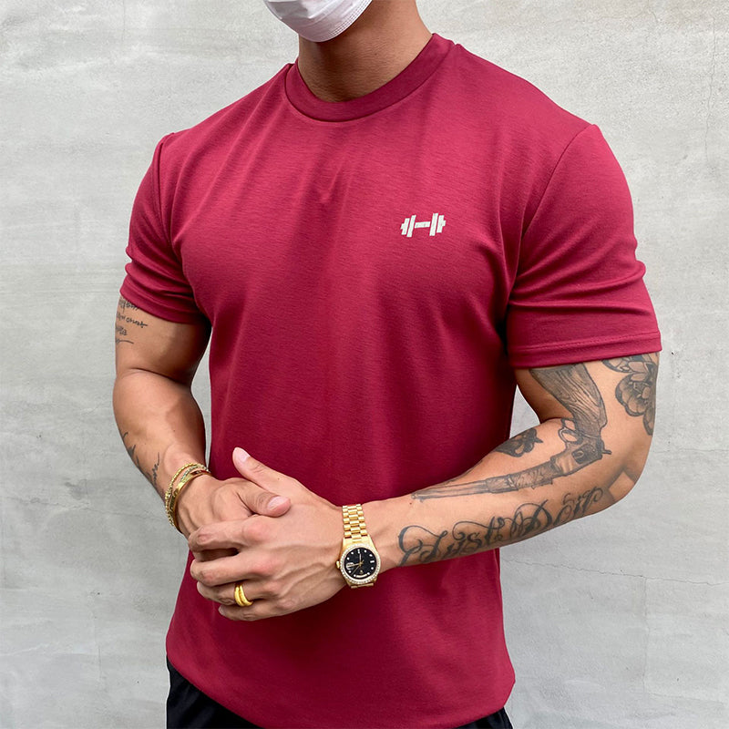 "Stretchig sport-T-shirt för herrar i bomull, khaki färg, med kort ärm och rund hals för optimal rörlighet och komfort."