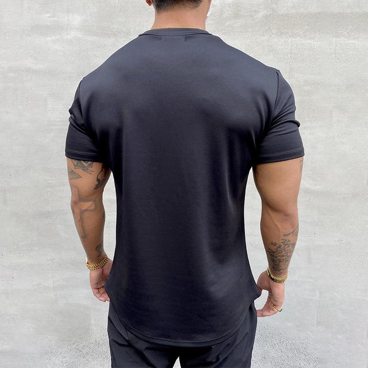"Stretchig sport-T-shirt för herrar i bomull, khaki färg, med kort ärm och rund hals för optimal rörlighet och komfort."