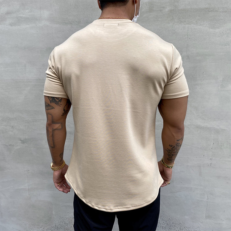 "Stretchig sport-T-shirt för herrar i bomull, khaki färg, med kort ärm och rund hals för optimal rörlighet och komfort."