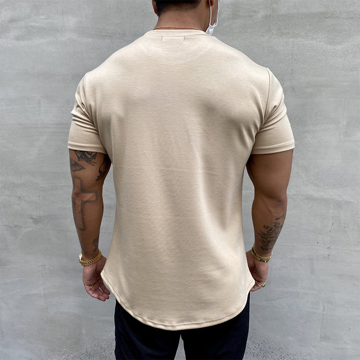 "Stretchig sport-T-shirt för herrar i bomull, khaki färg, med kort ärm och rund hals för optimal rörlighet och komfort."