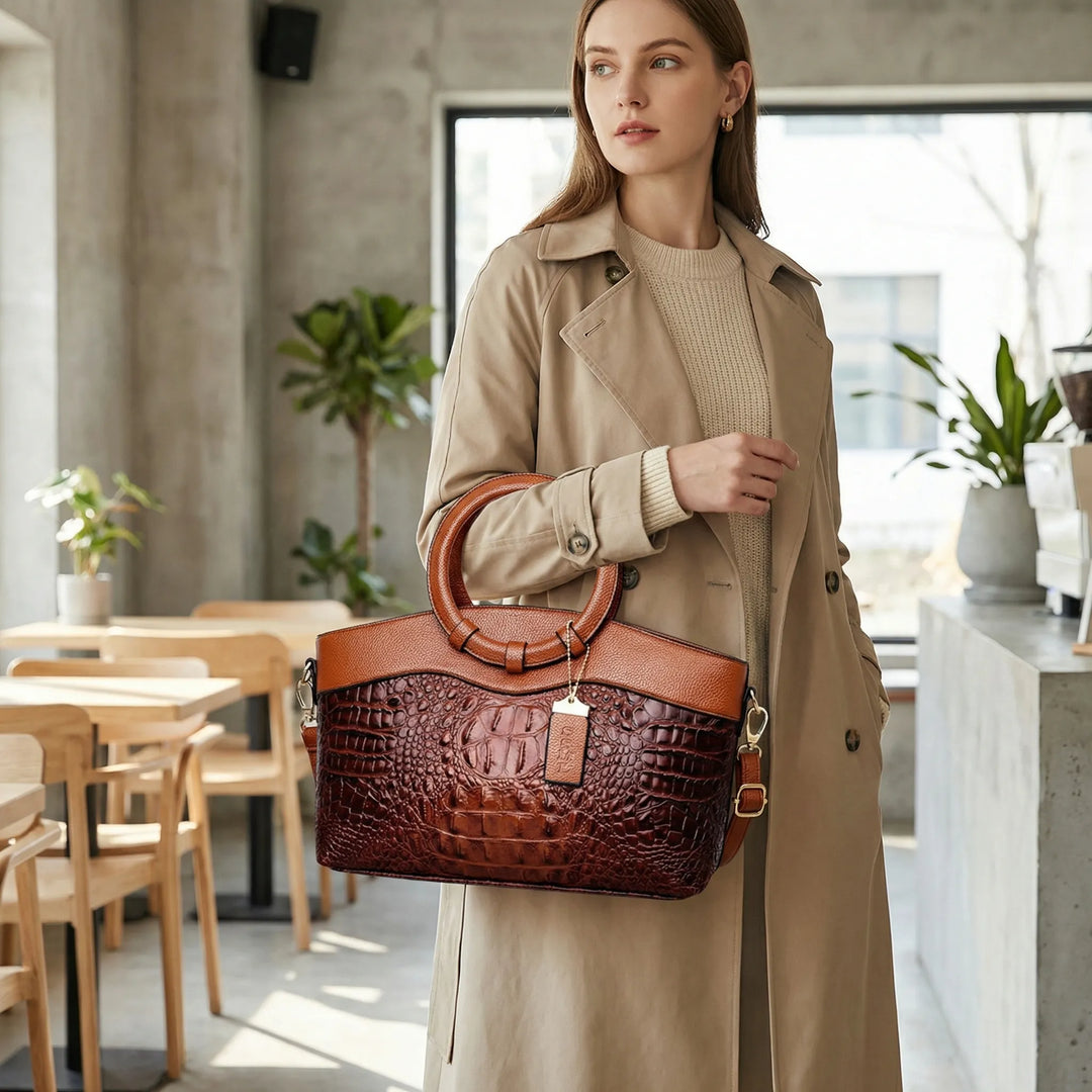 Strukturerad brun axelremsväska Leah för dam med elegant bärhandtag. Stilren vardagsväska & modeaccessoar.