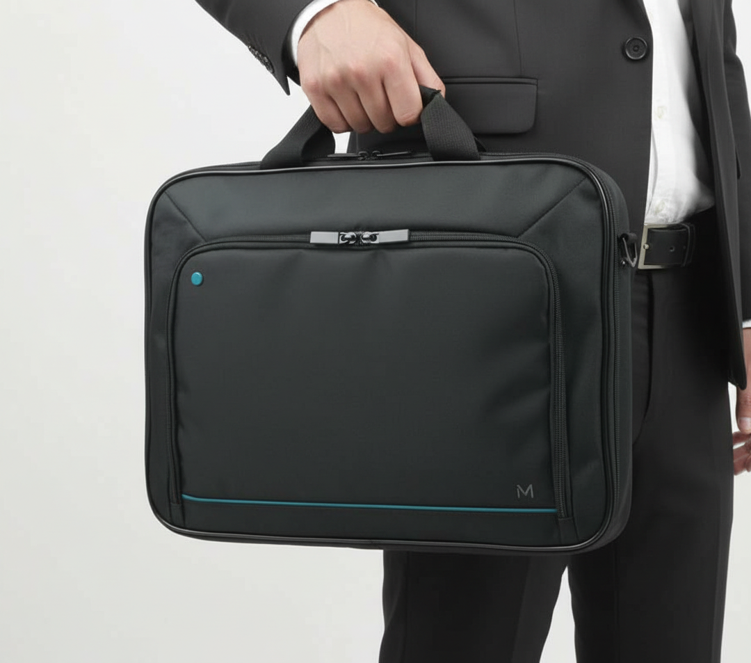 Organiserad damväska för laptop, skyddar bärbar dator vid pendling, med flera fack.