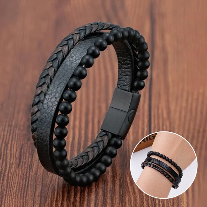 "Svart flätat läderarmband med hematitpärlor, stresslindrande och elegant accessoar för moderna män."