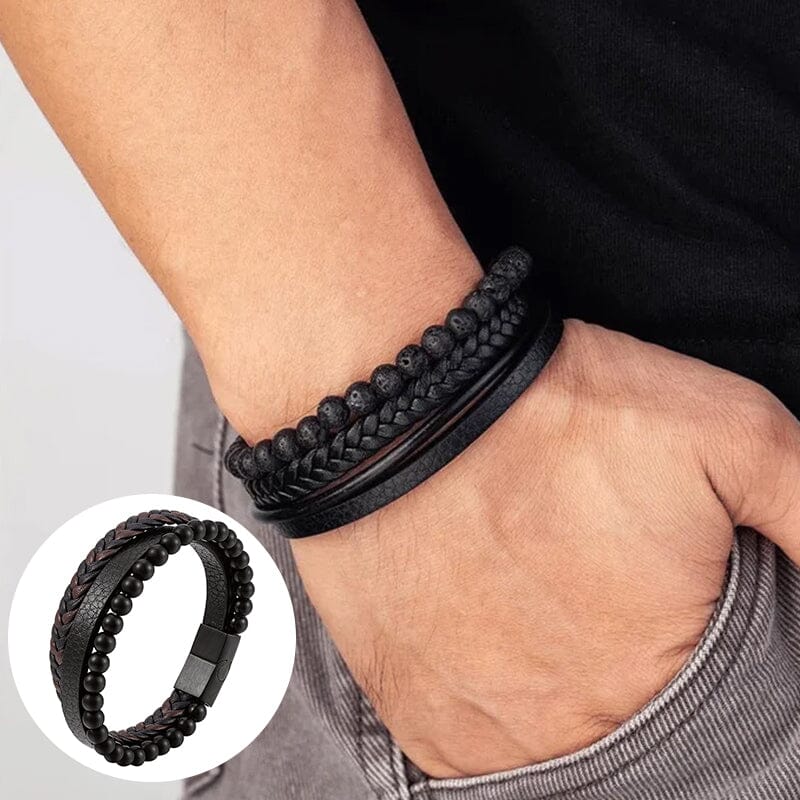 "Svart flätat läderarmband med hematitpärlor, stresslindrande och elegant accessoar för moderna män."