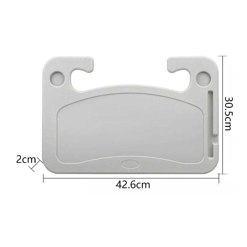 Förare njuter av fika med FlexiWheel bilrattsbord, ergonomisk design för bekväm paus i bilen.