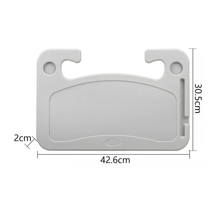 Förare njuter av fika med FlexiWheel bilrattsbord, ergonomisk design för bekväm paus i bilen.