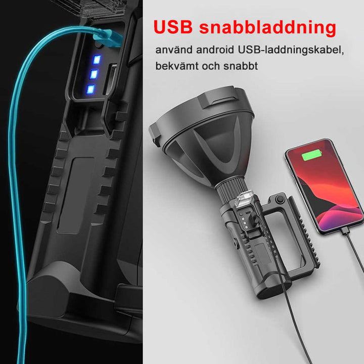 "Svart handhållen LED-ficklampa för utomhusbruk, 90000 lumens, IPX5, på träbänk, perfekt för nattvandring och camping."