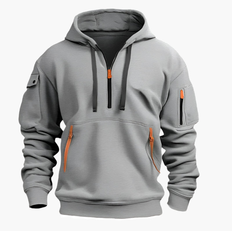 Marinblå herr hoodie med dragkedja, huva och flera fickor. Funktionell och stilren för streetwear.