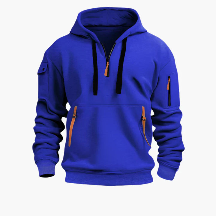 Detaljbild på en herr hoodie med robust dragkedja och justerbar huva. Funktionell streetwear-design.