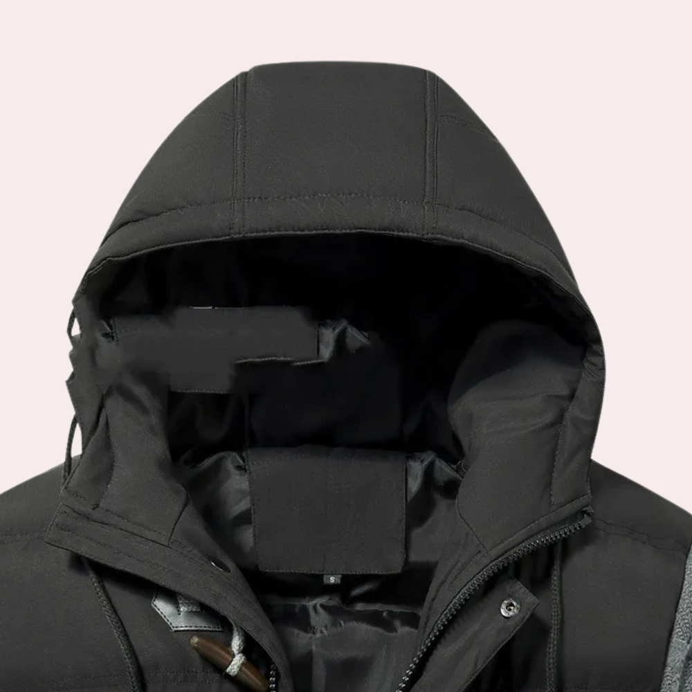 Varm herr pufferjacka i klassisk design, skyddande ytterkläder för vinterkyla. Svart, bekväm herrjacka.