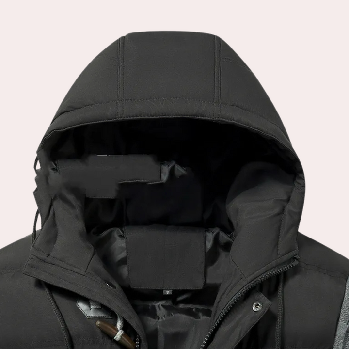 Varm herr pufferjacka i klassisk design, skyddande ytterkläder för vinterkyla. Svart, bekväm herrjacka.