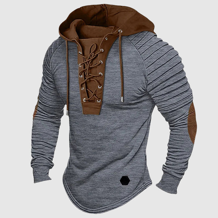 Bekväm herrhoodie i blått med dragsko, idealisk för fritid och streetwear. Tidlös herrkläder.