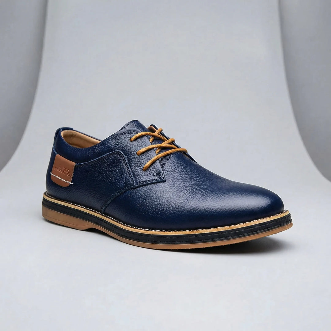 Elegant blå herrsko Eli med låg klack, en bekväm och formell sko för alla tillfällen.