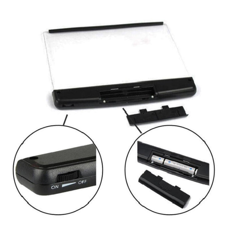 "Svart LED bokljus med tre justerbara lampor, lätt och portabel design för nattläsning och resor, perfekt för bokälskare."