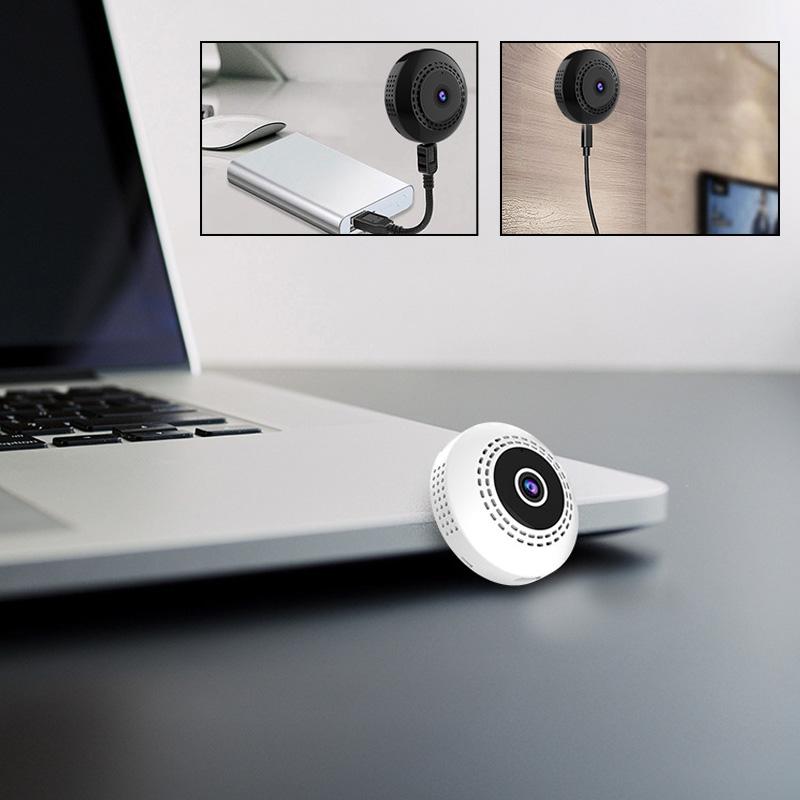 Svart mini WiFi-kamera för hem och bil, kompakt design, högupplöst video, night vision, magnetisk bas för enkel placering.